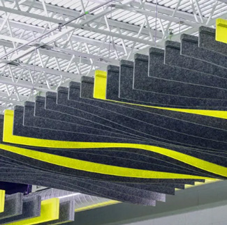 Commercial baffle rafts suspended from a very high ceiling.