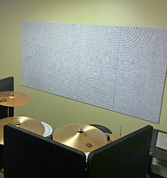 Acoustic V-Grooved wall Panels and Black Gobos in drums practice room