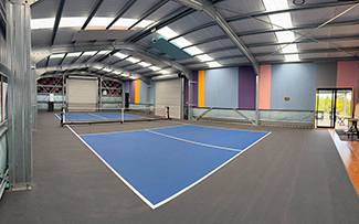 Acoustic Ceiling and Wall Panels in a South Auckland Paddle Tennis court.