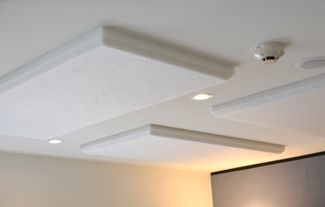 White Bevel Edge Acoustic ceiling 
panels in a small office.