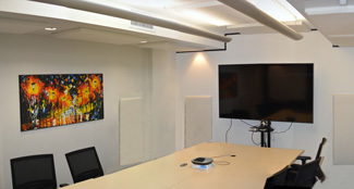 White Acoustic wall and ceiling 
panels in Video Conferencing room